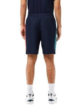 Short Lacoste Trainingsanzug Marineblau für Männer.