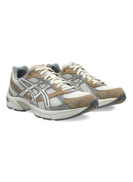 Turnschuhe Asics GEL-1130 weiß und beige für Herren und Damen.