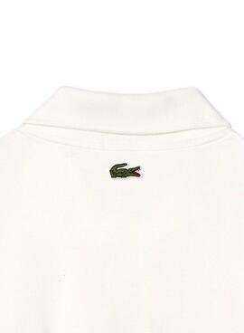 Polo Lacoste L.12.12 mit weißem Logo-Aufdruck für Herren und Damen.