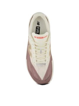 Turnschuhe New Balance Fuelcell Rebel V5 in Beige und Lila für Herren