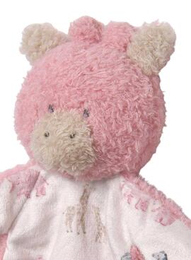 Gugú Mayoral hängt rosa Schnuller für Baby auf