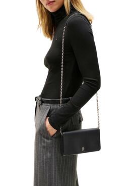 Brieftasche Tommy Hilfiger Icon mit Umschlag und Riemen in Schwarz für Damen.