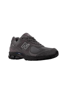 Turnschuhe New Balance U2002R lila und schwarz für Herren