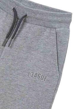 Trainingsanzug von Mayoral, dreiteilig in gelb, grau und schwarz für Jungen.