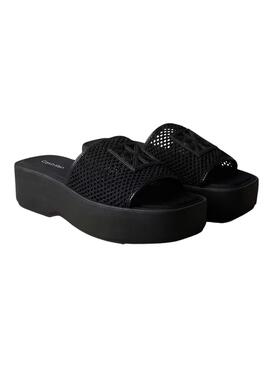 Geflochtene Calvin Klein-Sandalen mit schwarzer Plateausohle für Damen.